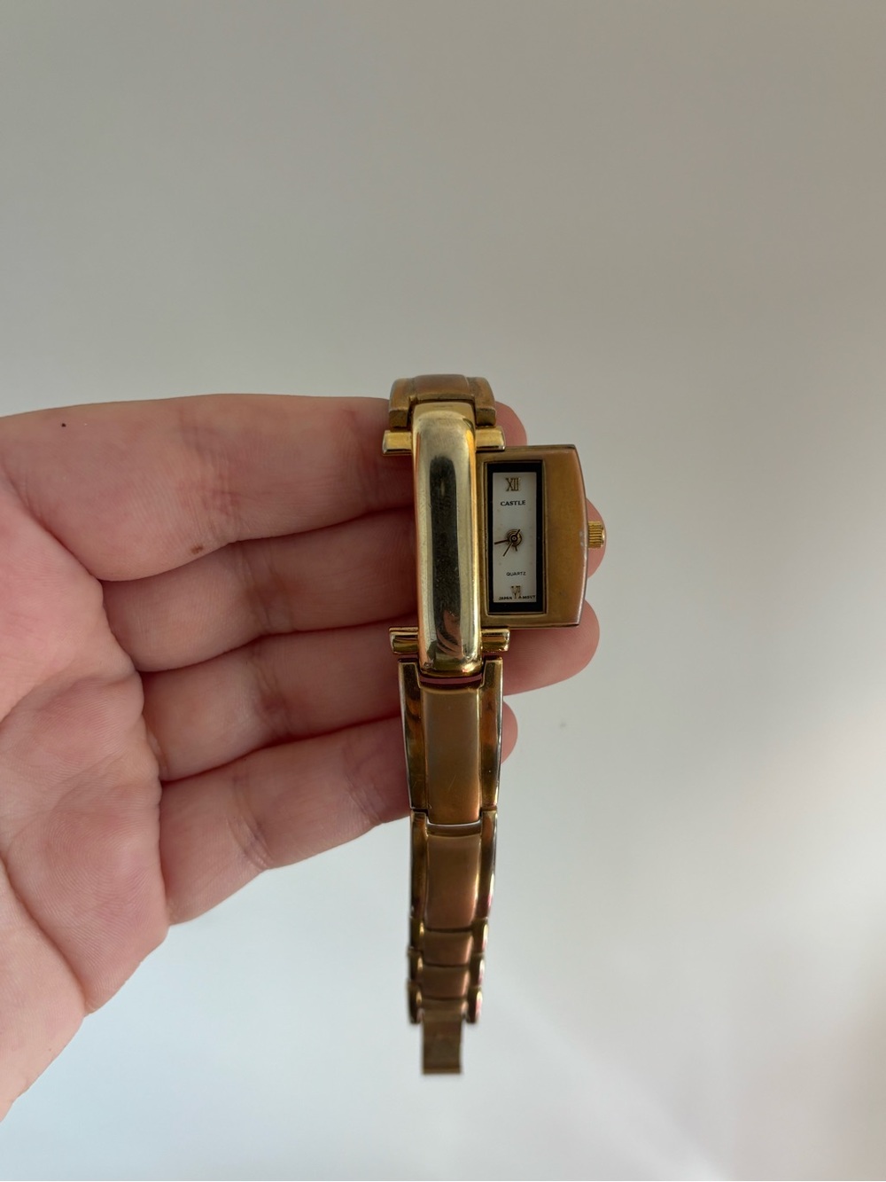 Castle Gold-Tone Women's Bracelet Watch - Sleek Rectangular Dial